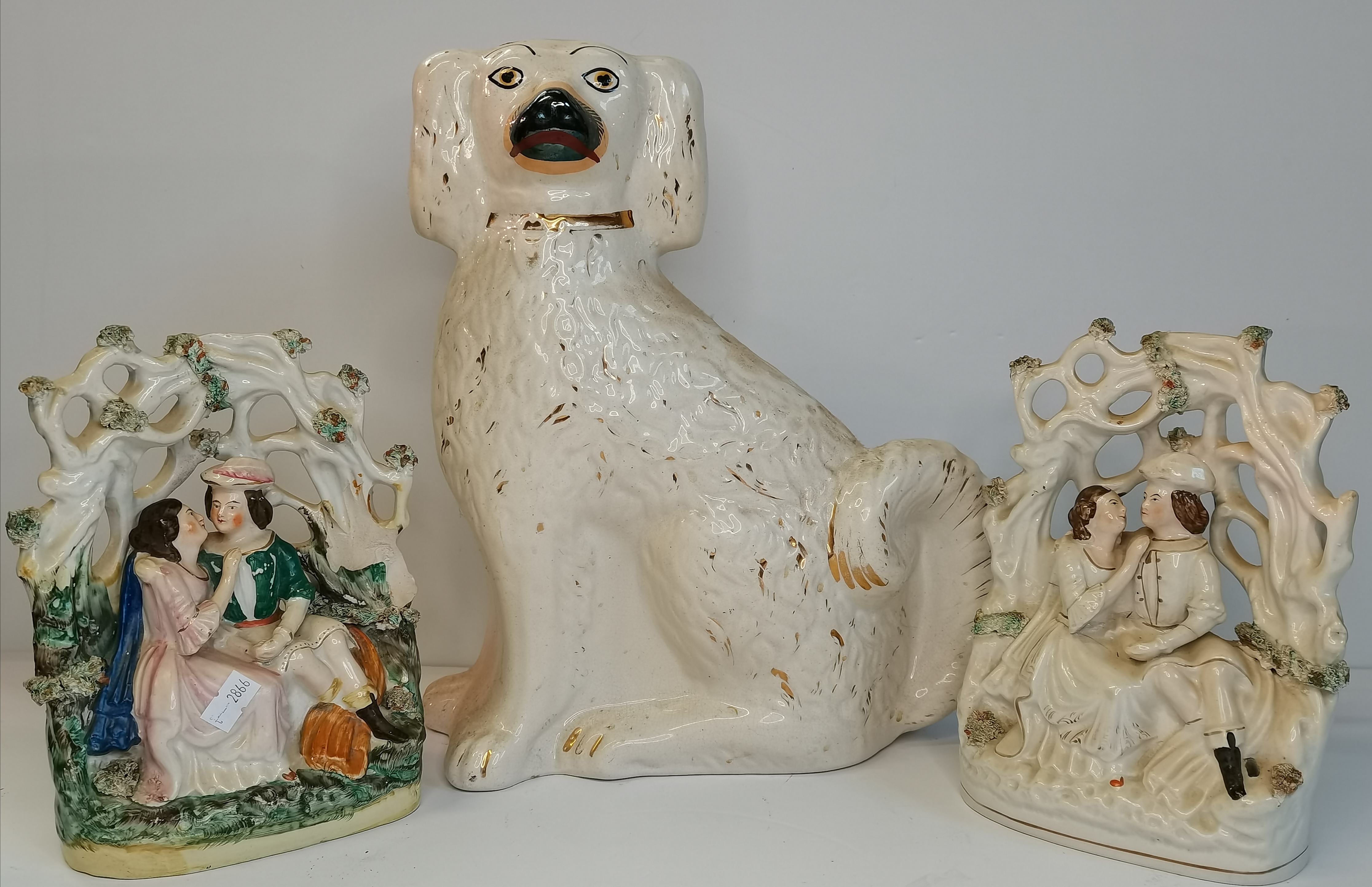 A similar pair of Staffordshire figures plus large