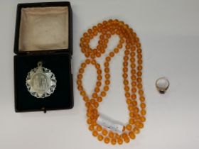 Carved Pendant (poss Mother of Pearl) & Amber beaded necklace