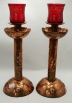 A good pair of Arts and Crafts copper 32cm candlesticks marked NEWLYN