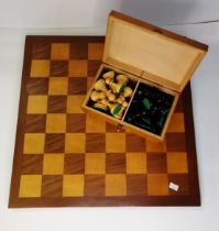 A wooden chess set and board