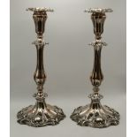 A pair of Victorian silver-plated candlesticks