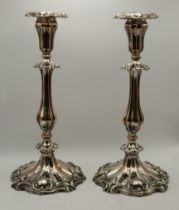 A pair of Victorian silver-plated candlesticks