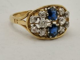 An 18ct gold and platinum diamond and sapphire ?? (CHECK) ring