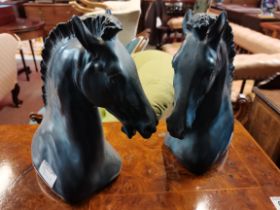 A pair of horse busts 27cm high