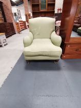 Howard style armchair upholstered in green fabric