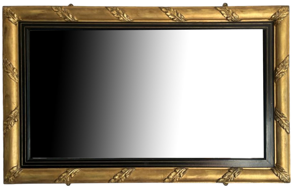 A 19TH CENTURY GILT FRAMED MIRROR With applied leaf decoration, the silvered plate enclosed with