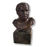 A BRONZE ROMAN EMPORER BUST On marble base. (approx overall size 16cm) Condition: good