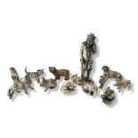 A COLLECTION OF TEN CONTINENTAL MINIATURE WHITE METAL FIGURES OF WILD ANIMALS Including a fox,