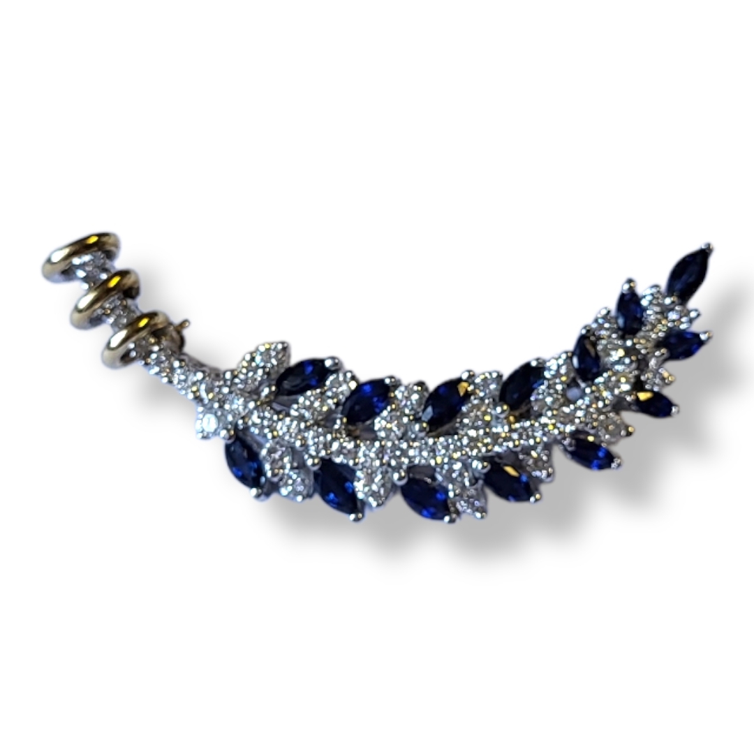 AN EARLY 20TH CENTURY DESIGN GOLD DIAMOND AND SAPPHIRE FERN LEAF BROOCH. Condition: good throughout