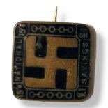 AN EARLY 20TH CENTURY BRASS AND ENAMEL NATIONAL SAVINGS ‘SWASTIKA' SQUARE BADGE With black enamel
