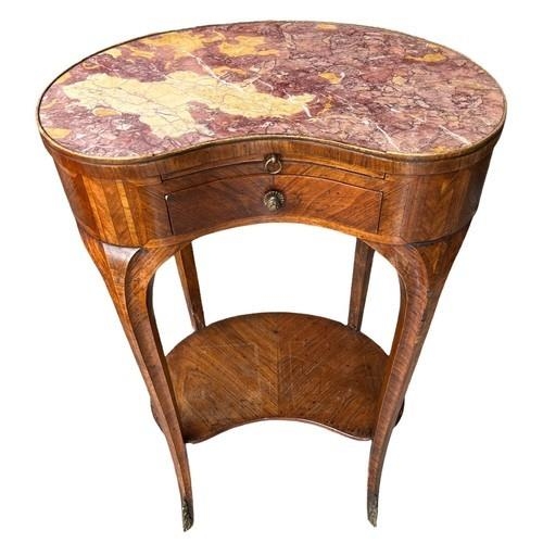 AN 18TH CENTURY FRENCH KIDNEY SHAPED SIDE TABLE The rouge inset top above slide and drawers, on