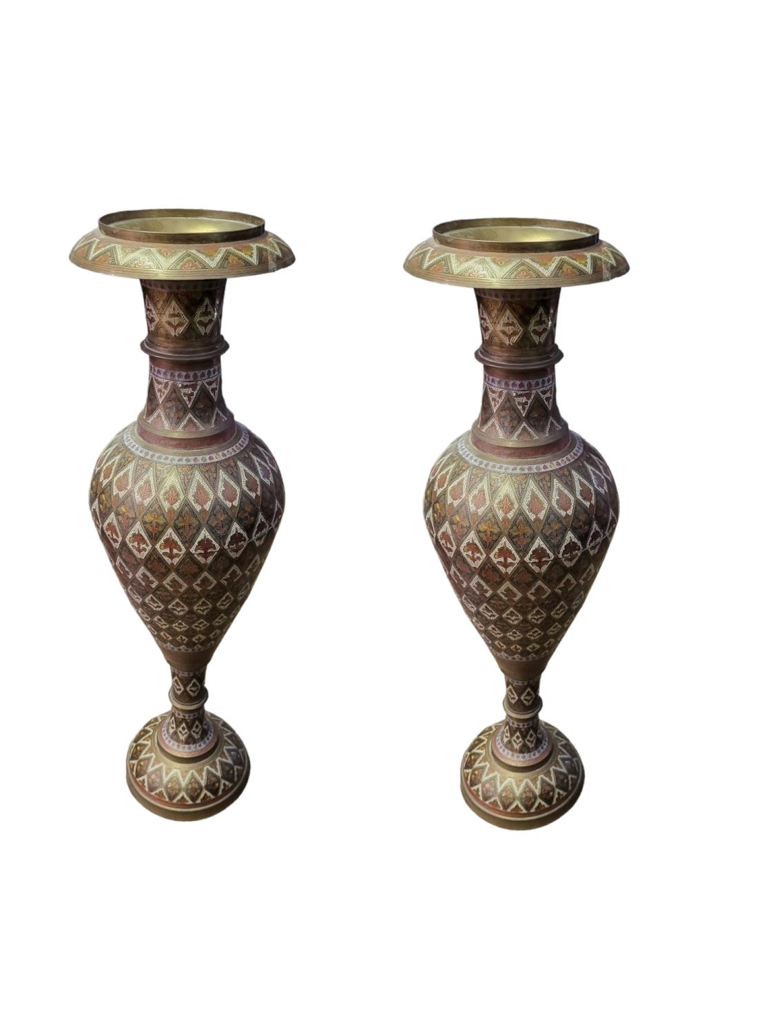 A PAIR OF 20TH CENTURY LARGE INDIAN BRASS AND ENAMEL BALUSTER SHAPED VASES Decorated with