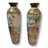 A PAIR OF 19TH CENTURY JAPANESE MEIJI KUTANI PORCELAIN VASES Tapering ovoid form, finely painted