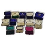 A COLLECTION OF TWELVE LATE 19TH/EARLY 20TH CENTURY BROOCH JEWELLERY BOXES To include Lawrence of