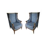 A PAIR OF LATE 19TH/20TH CENTURY FRENCH MAHOGANY WING ARMCHAIRS In blue fabric upholstery, on turned