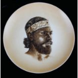 AN ABORIGNAL CONTINENTAL CABINET PLATE, CIRCA 1900 - 1920 A rare hard paste porcelain plate, with