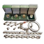 A COLLECTION OF VINTAGE SILVER BANGLES AND BRACELETS To include a charm bracelet,marcasite bangle