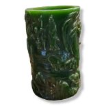 A 20TH CENTURY GREEN GLAZED CHINESE JADE CYLINDRICAL BRUSH POT Carved with immortals and pagodas