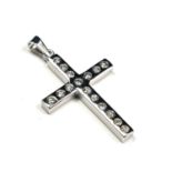 A VINTAGE WHITE METAL AND DIAMOND CRUCIFIX PENDANT Two rows of round cut stones in a plain
