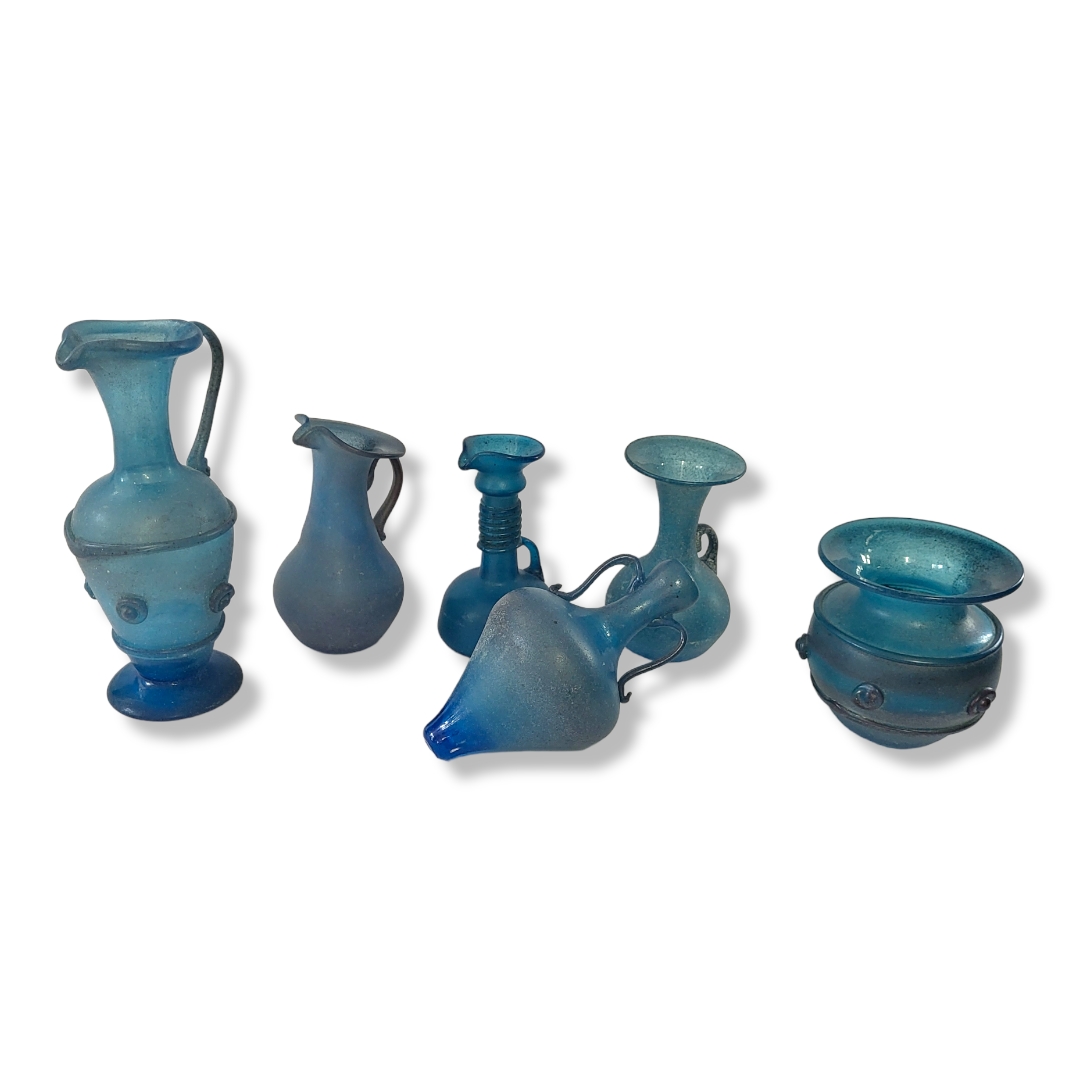 A COLLECTION OF SPANISH TURQUOISE ART GLASS Comprising five vessels with single handles and a