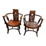 A PAIR OF ART NOUVEAU MAHOGANY TUB ARMCHAIRS With pierced backs, spindle rails, splayed legs. (