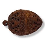 AN EARLY 20TH CENTURY CHINESE CARVED TREEN OVAL INSECT BOX With pierced decoration and hanging bale.