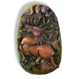 A CHINESE JADEITE OVAL PENDANT Carved with a horse and foliage. (9.5cm) Condition: good