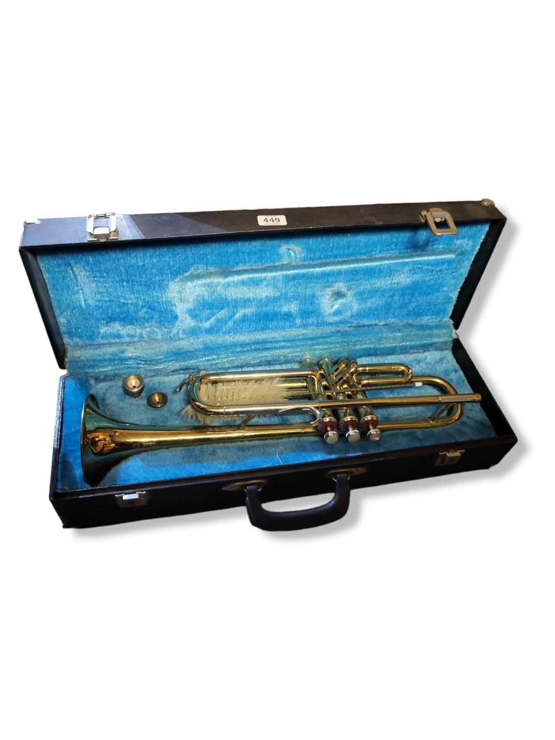 A B&M CHAMPION BRASS TRUMPET With two mouthpieces, in hard carry case. (case 55cm x 18cm x 12cm)