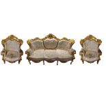 A FRENCH DESIGN CARVED GILT FRAMED THREE PIECE SUITE. Condition: upholstery worn