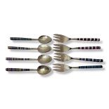 A SET OF EIGHT VINTAGE WHITE METAL AND HARDSTONE CUTLERY Comprising four forks and four spoons, each