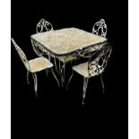 AN EARLY 20TH CENTURY WROUGHT IRON AND PIERCED STEEL GARDEN TABLE AND FOUR CHAIRS With scrollwork