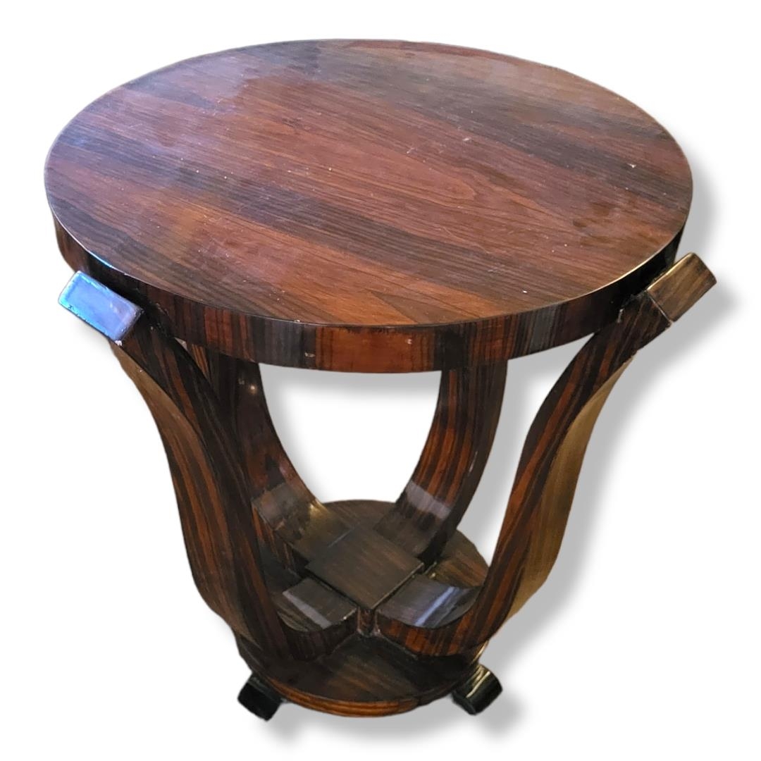 AN ART DECO STYLE LACQUERED ROSEWOOD OCCASIONAL TABLE. (diameter 67cm x 66cm) Condition: good