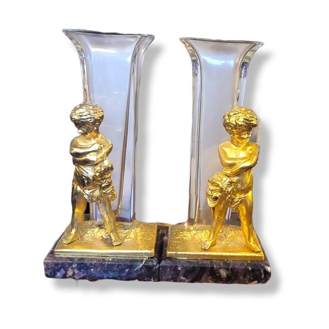 A PAIR OF GILT BRONZE, BLUE JOHN AND GLASS FIGURAL VASES The trumpet form glass vase with