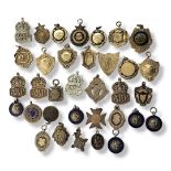 A COLLECTION OF EARLY 20TH CENTURY SILVER WATCH FOBS AND BADGES To include three silver and enamel