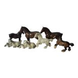 BESWICK, A SET OF FOUR POTTERY CANTERING SHIRE HORSES In brown gloss, modelled by Arthur Gredington,