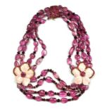 SABBADINI, A VINTAGE ITALIAN 18CT GOLD, PINK TOURMALINE, RUBY AND CORAL NECLKLACE Four strands of
