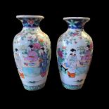 A PAIR OF 20TH CENTURY CHINESE FAMILLE ROSE OVOID PORCELAIN VASES Decorated with female figures in