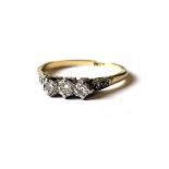 AN ART DECO PERIOD 18CT GOLD MOUNTED RING Set with three rows of diamonds, stamped, in Cassidy & Son