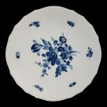 MEISSEN, AN EARLY 20TH CENTURY HARD PASTE PORCELAIN BLUE AND WHITE FLOWERS AND INSECTS CAKE STAND,