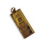 A VINTAGE 9CT GOLD RECTANGULAR INGOT PENDANT With large hallmarks and hanging bale. (approx 4cm x