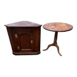 A 19TH CENTURY MAHOGANY SUPPER TABLE The one piece circular top, raised on a term column with