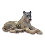 ROYAL COPENHAGEN, A HARD PASTE PORCELAIN MODEL OF AN AFRICAN LIONESS Monochrome painted in grey