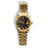 ROLEX, OYSTER PERPETUAL DATEJUST, AN 18CT GOLD AND STAINLESS STEEL GENT’S WRISTWATCH Having a gold