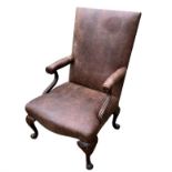 AN 18TH CENTURY STYLE WALNUT FRAMED GAINSBOROUGH OPEN ARMCHAIR Newly upholstered in a tan leather,