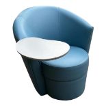 REVOLUTION 2000, A BLUE LEATHER UPHOLSTERED TUB ARMCHAIR With integral table and booklet. (96cm x
