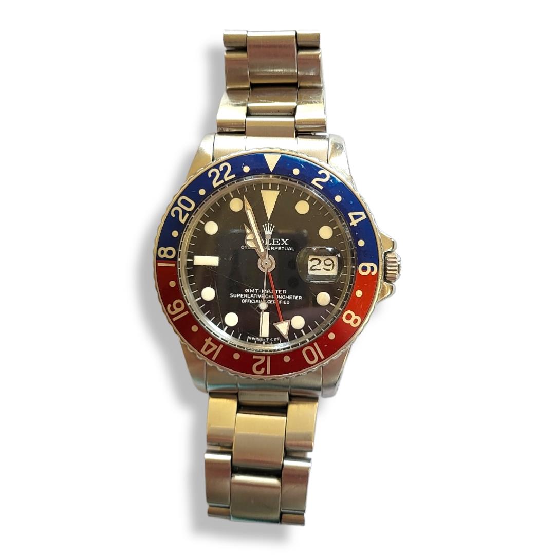 ROLEX, OYSTER PERPETUAL GMT, A VINTAGE STAINLESS STEEL GENT’S WRISTWATCH Having a red and blue ' - Image 2 of 5