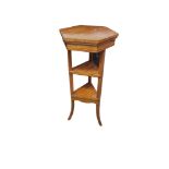 AN EARLY 20TH CENTURY SATINWOOD THREE TIER OCCASIONAL TABLE CONVERTED FROM A MUSIC TABLE The