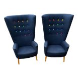 A PAIR OF TOM DIXON INSPIRED WING ARMCHAIRS In blue fabric upholstery with multi coloured buttons