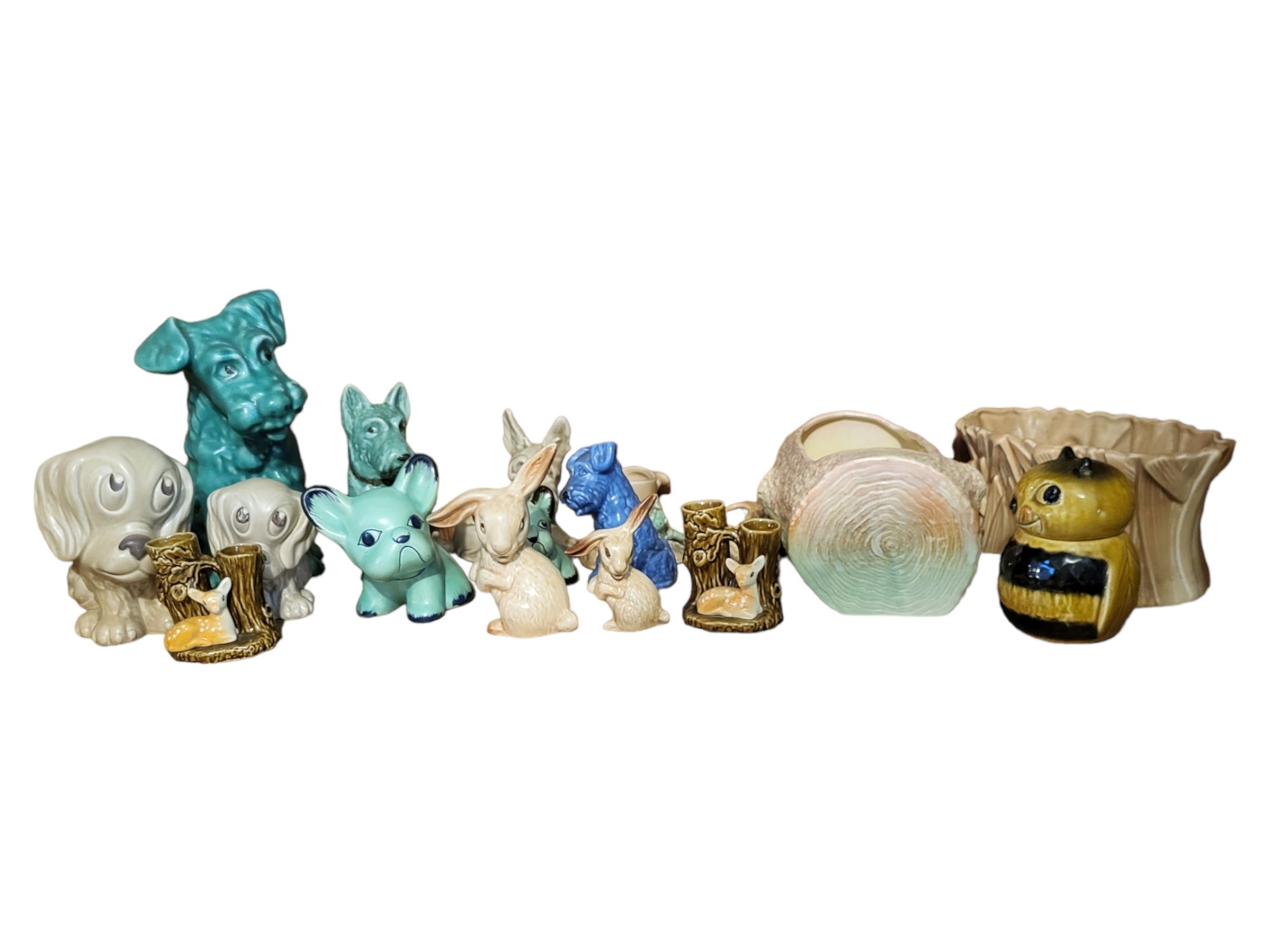 SYLVAC, A COLLECTION OF POTTERY ANIMAL FIGURES To include two sad sam figures, green glazed dog,