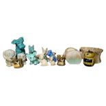 SYLVAC, A COLLECTION OF POTTERY ANIMAL FIGURES To include two sad sam figures, green glazed dog,